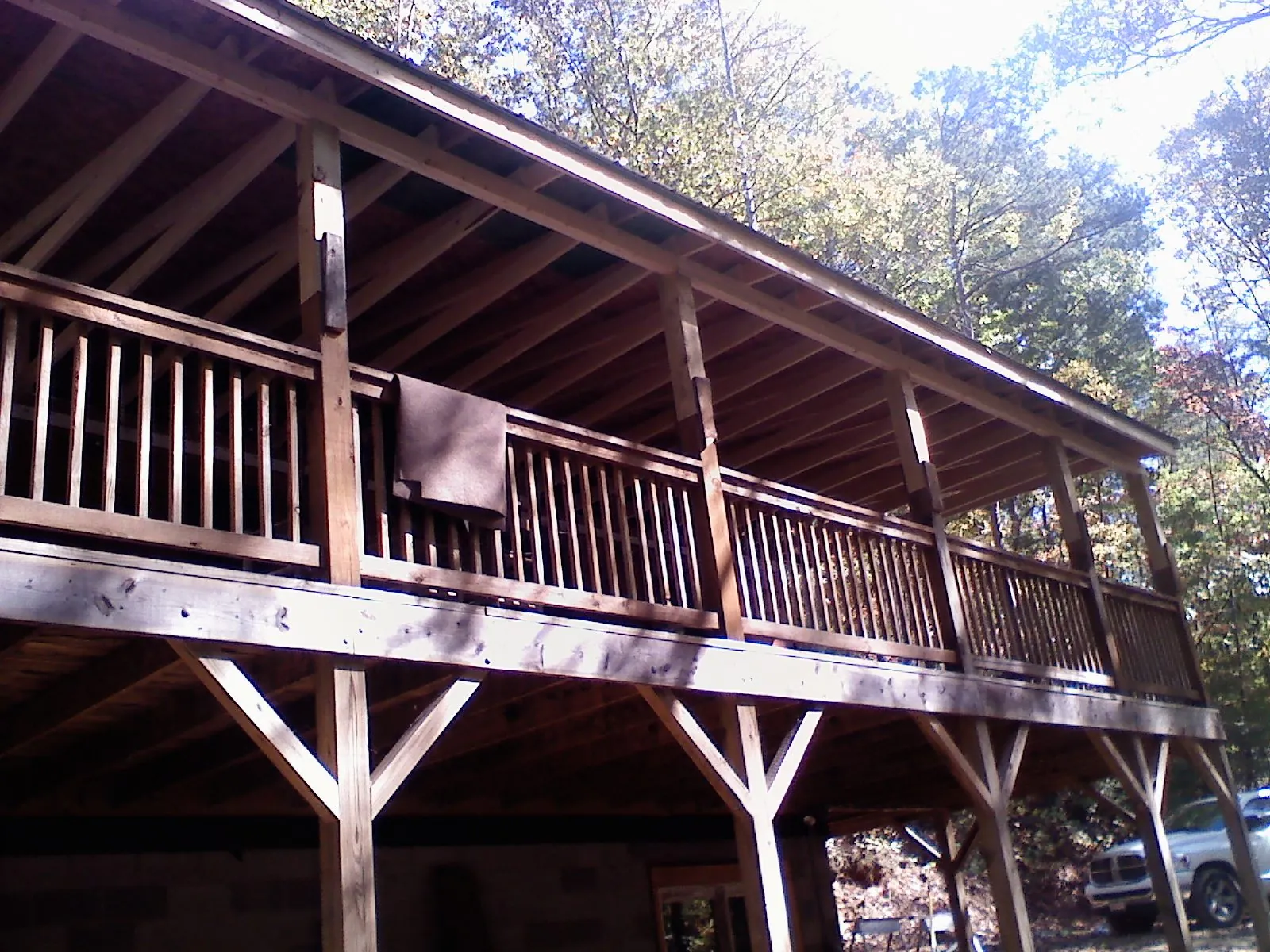 Timber framing under a new elevated porch and deck — Roof Leak Repair in Breezy Point by Roofing Brothers